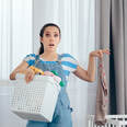 Woman holding a laundry basket